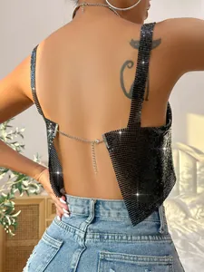 Detailed back view of a sexy black sequin metal mesh backless crop top with chains.