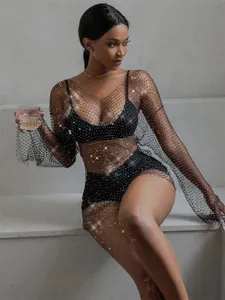 Detailed view of black rhinestone mesh long-sleeve cover-up dress for women