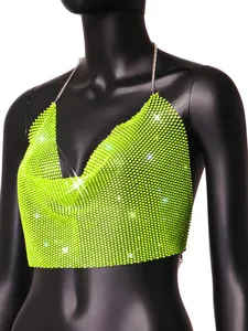 Primer plano de un top halter de malla con pedrería verde neón en un maniquí negro