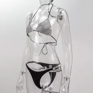 Detailed view of sexy rhinestone triangle bikini top and high leg bottom on mannequin