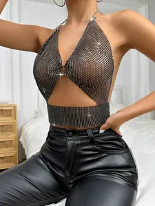 Close-up detail of black rhinestone mesh halter top featuring a sexy backless crop design