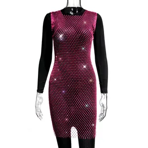Detail view of an elegant pink mesh rhinestone dress with sparkling crystals for evening wear