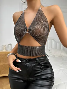 Detailed macro view of black rhinestone mesh halter crop top with sparkling crystals