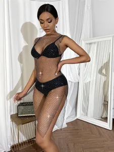 Detail view of the sophisticated black mesh fabric with sparkling rhinestone accents.