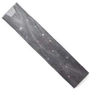 Macro view of the sparkly rhinestone mesh fabric used for elegant evening party dresses