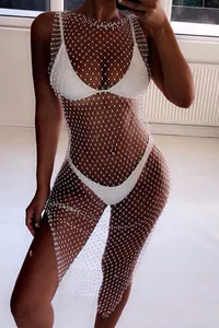 Detailed view of white rhinestone mesh bikini cover-up dress for summer