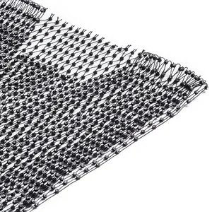 Macro view of black mesh fabric with high-quality sparkling rhinestone embellishments