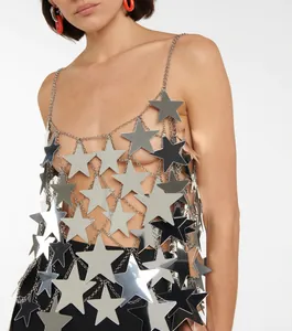 Detailed shot of shiny metallic star sequin hollow chain vest for summer party style