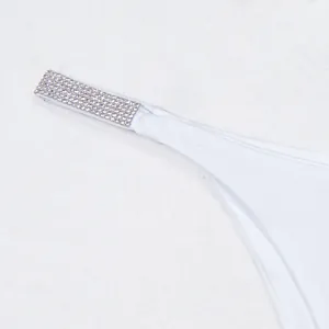 High quality close-up of white bikini strap with luxury sparkling rhinestone decoration detail