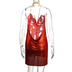 Red metallic chainmail mini dress detail with deep V-neck and halter design