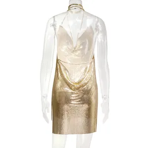 Detailed back view of a sexy gold metallic mesh backless halter mini dress for nightclub wear