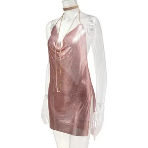 Detailed side view of a rose gold metallic mesh backless mini dress with chain halter neck