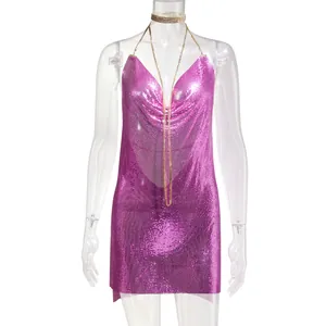 Close-up view of a sexy pink metallic mesh mini dress with deep V-neck and halter straps
