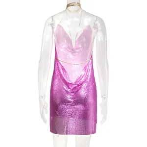 Back view of sexy pink metallic sequin mini dress with open back and chain straps
