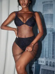 Elegant black mesh rhinestone dress for women featuring sparkling crystal details.