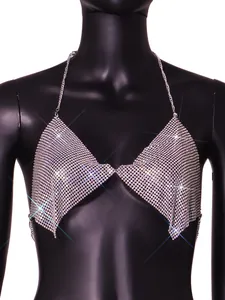 Close-up of sparkly iridescent rhinestone mesh halter top with silver metal chain straps