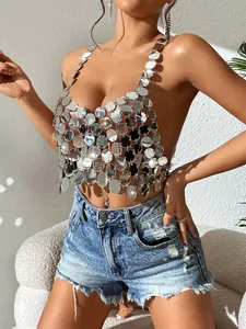 Detail view of a sexy silver acrylic mirror disc halter top for nightclub party wear