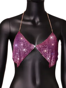 Close-up detail of a sparkling pink rhinestone backless halter top on a mannequin