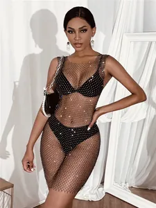 Elegant black rhinestone mesh dress with shimmering crystals and sheer netting design