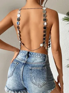 Close-up detail of sexy silver acrylic sequin backless halter top for party and club wear