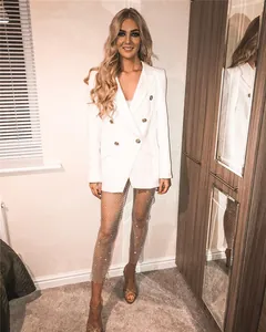 Pantalones de malla sexys para mujer con detalles de pedrería brillante en modelo