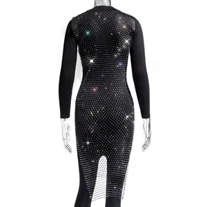 Detailed back view of a black long-sleeve dress featuring a sparkling rhinestone mesh overlay