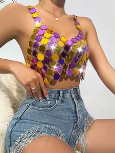 Detail showing colorful sparkling acrylic sequin halter top and fringe denim shorts