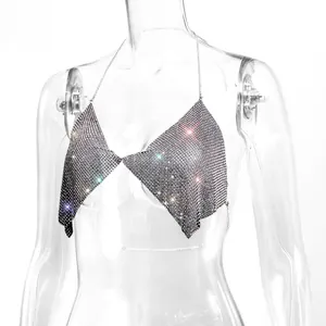Close-up of sparkling rhinestone halter top with backless chain design for nightclub