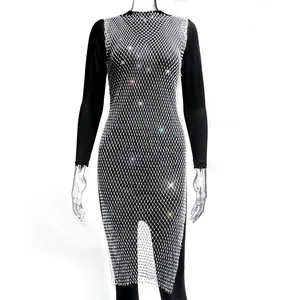 Macro detail of sparkly rhinestone mesh dress with shimmering round neck party wear design.