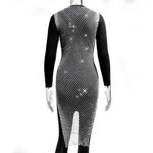 Close-up detail of silver rhinestone mesh overlay on black long-sleeved women's dress