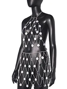 Detailed view of sexy silver acrylic mirror chain link hollow-out clubwear set.