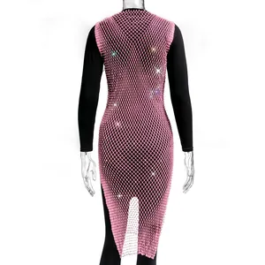 Close-up of pink fishnet dress with sparkling rhinestones and mesh texture.