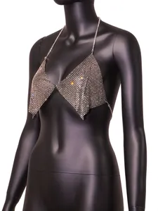 Side view detail showing the shimmering silver rhinestone texture and chain straps