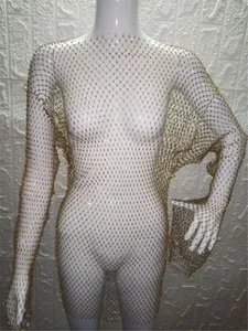 Elegant gold rhinestone long sleeve mesh dress for women, sparkling evening party outfit.