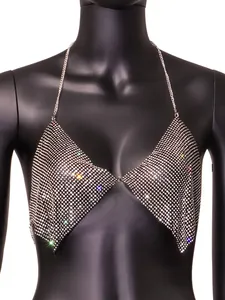Detailed view of sparkling silver rhinestone mesh halter top with metallic chain straps