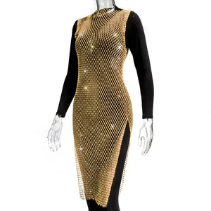 Detail view of golden rhinestone mesh dress with sparkling crystal embellishments