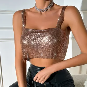 Macro view of rose gold sequin metal mesh crop top showcasing shimmering metallic texture