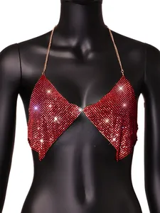 Macro view of sexy red sparkling rhinestone halter top with elegant gold chain neck strap.