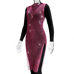Detailed view of pink mesh dress with shimmering rhinestones and side split design.