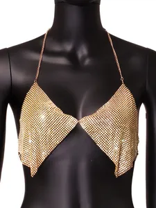 Detailed close-up showing the sparkling gold metal chainmail texture of this halter crop top