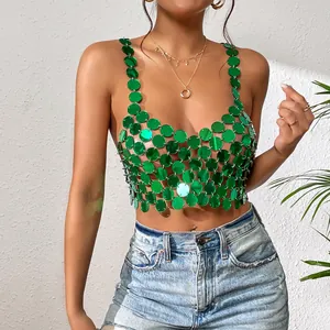 Close-up detail of a vibrant green acrylic sequin halter top worn by a female model