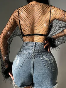 Detailed back view of sparkling rhinestone fishnet long sleeve mesh top for women