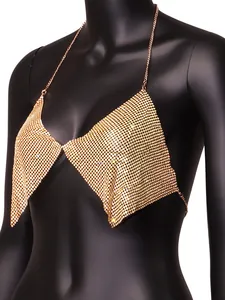 Close-up detail of golden sparkling rhinestone halter chain top for nightclub fashion
