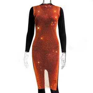 Close-up of orange rhinestone mesh dress with shimmering detail and grid pattern