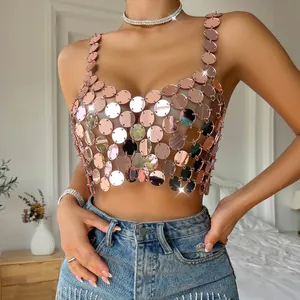 Close-up of a glamorous rose gold acrylic sequin disc crop top perfect for night club wear
