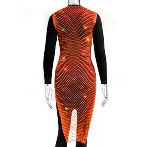 Detailed back view of orange rhinestone fishnet mesh dress showing sparkling crystals and slit