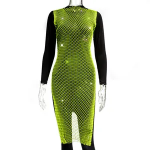 Detailed view of neon green fishnet dress featuring sparkling rhinestone embellishments