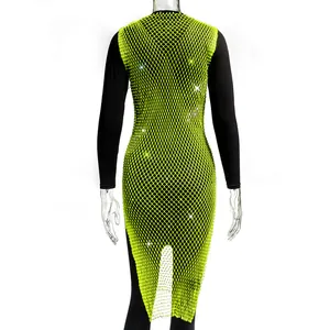 Detailed back view of a neon green mesh dress decorated with shimmering rhinestones