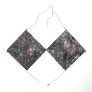 Detailed macro view of a sparkling black rhinestone chain halter top for glamorous party wear