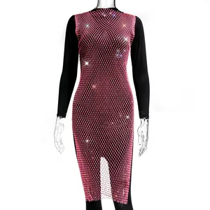 Detailed view of the pink rhinestone mesh dress featuring sparkling crystals on a sheer grid fabric